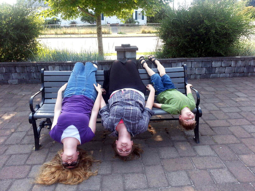 Picture of kids on a park bench